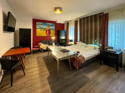TV/Unterhaltungsangebot in der Unterkunft Trip Inn Boutique Rubens