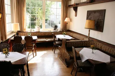 Ein Sitzbereich in der Unterkunft Hotel Diening