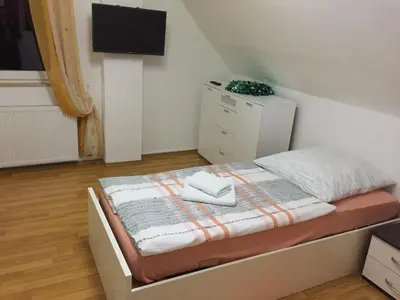 Ein Bett oder Betten in einem Zimmer der Unterkunft LORENZ Apartment 2
