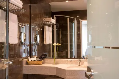 Ein Badezimmer in der Unterkunft l'Arrivée Hotel & Spa