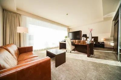 Ein Sitzbereich in der Unterkunft l'Arrivée Hotel & Spa