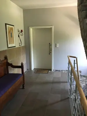 Ein Bett oder Betten in einem Zimmer der Unterkunft Stadtvilla Intzeplatz - Apartment Sylt