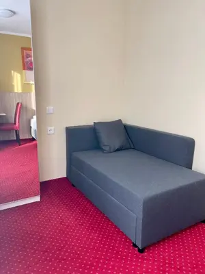 Ein Sitzbereich in der Unterkunft Palm Premium Hotel & Apartments