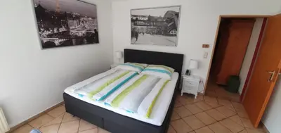 Ein Bett oder Betten in einem Zimmer der Unterkunft Chrissi und Micha