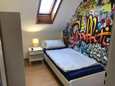 Ein Bett oder Betten in einem Zimmer der Unterkunft Wondervolles zuhause auf Zeit