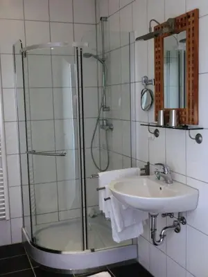 Ein Badezimmer in der Unterkunft Raffelberger Hof