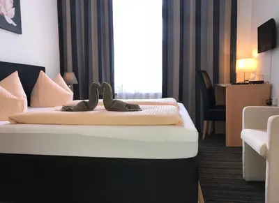 Ein Bett oder Betten in einem Zimmer der Unterkunft Hotel Antoni