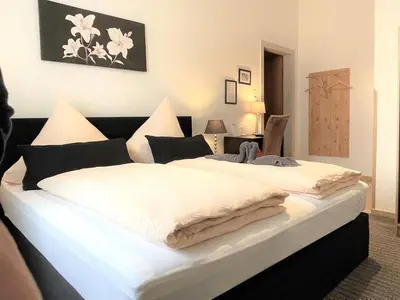 Ein Bett oder Betten in einem Zimmer der Unterkunft Hotel Antoni