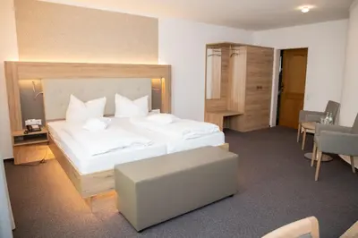 Ein Bett oder Betten in einem Zimmer der Unterkunft Hotel Restaurant Große Teichsmühle