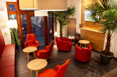 Ein Sitzbereich in der Unterkunft Hotel Specht by Trotmannia