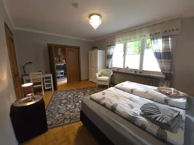 Ein Bett oder Betten in einem Zimmer der Unterkunft HR Townhouse Honigbach