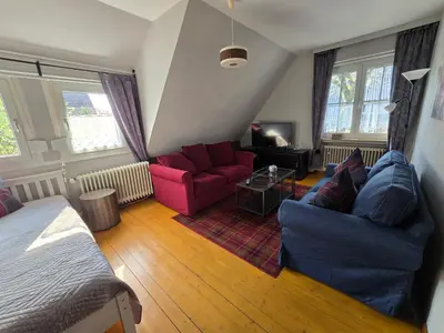 Ein Sitzbereich in der Unterkunft HR Townhouse Honigbach