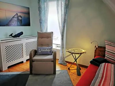 Ein Sitzbereich in der Unterkunft HR Townhouse Honigbach