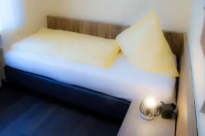 Ein Bett oder Betten in einem Zimmer der Unterkunft Breer S Hotel
