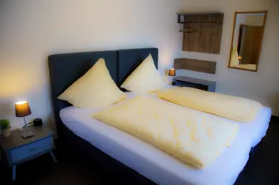 Ein Bett oder Betten in einem Zimmer der Unterkunft Breer S Hotel