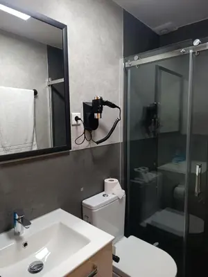 Ein Badezimmer in der Unterkunft Breer S Hotel
