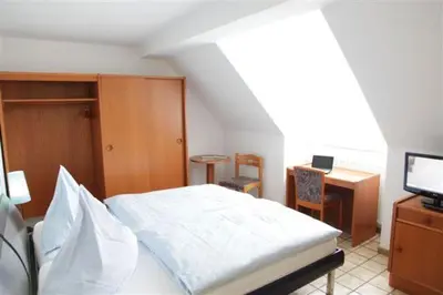 Ein Bett oder Betten in einem Zimmer der Unterkunft Breer S Hotel