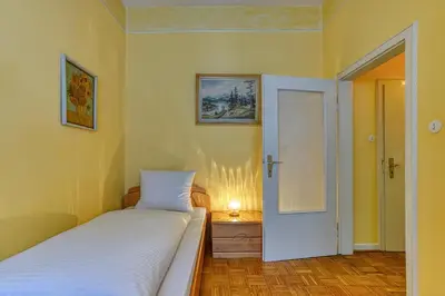 Ein Bett oder Betten in einem Zimmer der Unterkunft Hotel Carlton