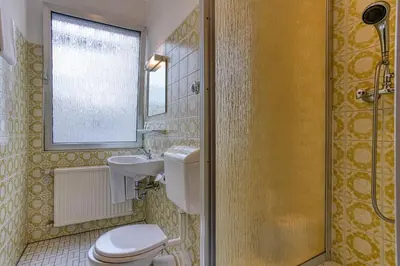 Ein Badezimmer in der Unterkunft Hotel Carlton