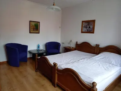 Ein Bett oder Betten in einem Zimmer der Unterkunft Mutter Siepe