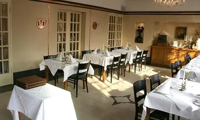Ein Restaurant oder anderes Speiselokal in der Unterkunft Mutter Siepe