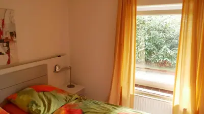 Ein Bett oder Betten in einem Zimmer der Unterkunft Wohnen bei Anke
