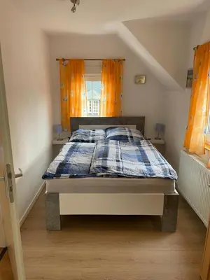 Ein Bett oder Betten in einem Zimmer der Unterkunft Ferienhaus Pacco