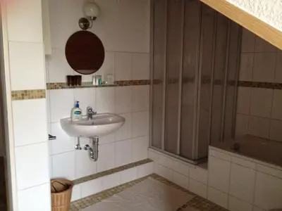 Ein Badezimmer in der Unterkunft Fair & the City