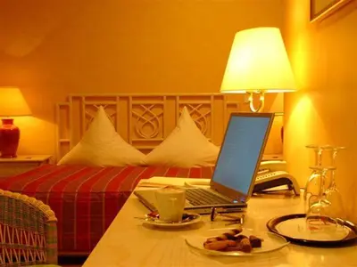 Ein Bett oder Betten in einem Zimmer der Unterkunft Campus Garden Businesshotel