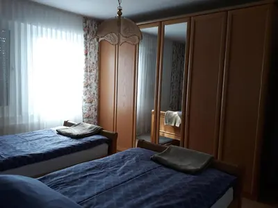 Ein Bett oder Betten in einem Zimmer der Unterkunft Am Klinikum