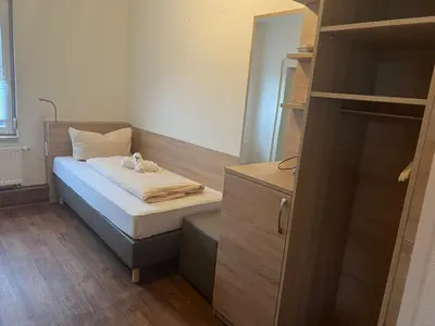 Ein Bett oder Betten in einem Zimmer der Unterkunft Tilla's Hof