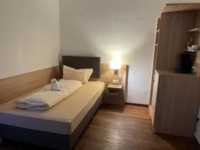Ein Bett oder Betten in einem Zimmer der Unterkunft Tilla's Hof