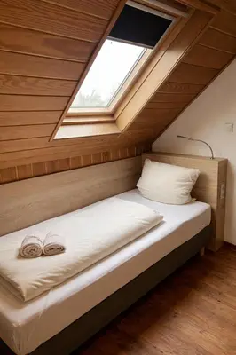 Ein Bett oder Betten in einem Zimmer der Unterkunft Tilla's Hof