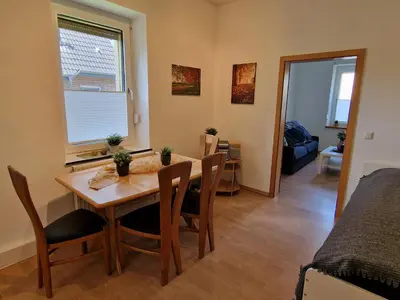 Ein Sitzbereich in der Unterkunft Gästewohnung am Mommbach