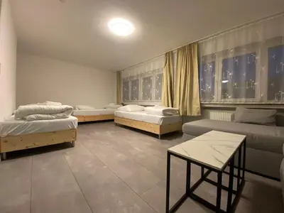 Ein Bett oder Betten in einem Zimmer der Unterkunft Oldtown Apartment Andreasstrasse