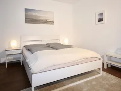 Ein Bett oder Betten in einem Zimmer der Unterkunft Apartmenthaus in der Arnoldstraße