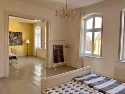 Ein Bett oder Betten in einem Zimmer der Unterkunft Beautiful apartment in a historic villa