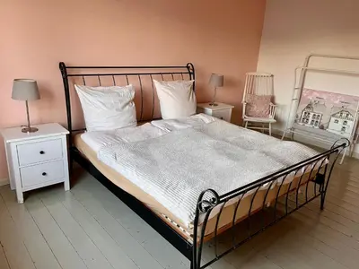 Ein Bett oder Betten in einem Zimmer der Unterkunft Beautiful apartment in a historic villa