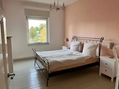 Ein Bett oder Betten in einem Zimmer der Unterkunft Beautiful apartment in a historic villa