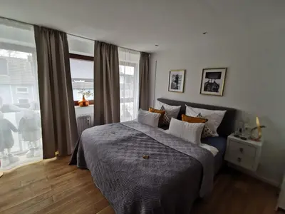 Ein Bett oder Betten in einem Zimmer der Unterkunft RhePi-Apartment