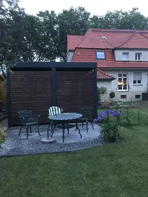 Ein Garten an der Unterkunft Haus in der Gartenstadt