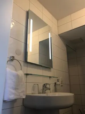Ein Badezimmer in der Unterkunft Hotel SchlossStuben