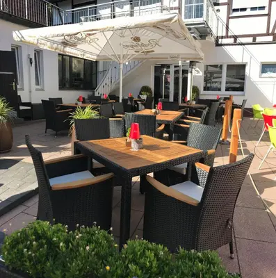 Ein Restaurant oder anderes Speiselokal in der Unterkunft Hotel SchlossStuben