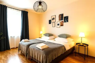 Ein Bett oder Betten in einem Zimmer der Unterkunft Airport Messe Hotel