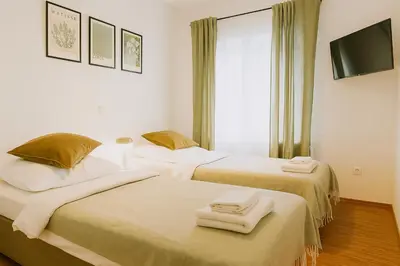 Ein Bett oder Betten in einem Zimmer der Unterkunft Airport Messe Hotel