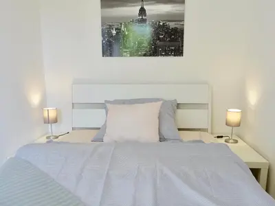 Ein Bett oder Betten in einem Zimmer der Unterkunft Fewo Neukirchen mit Balkon