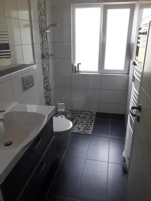 Ein Badezimmer in der Unterkunft Lieblingsmensch Oberhausen mit Terrasse
