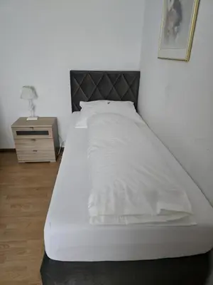 Ein Bett oder Betten in einem Zimmer der Unterkunft Gasthof Einhaus
