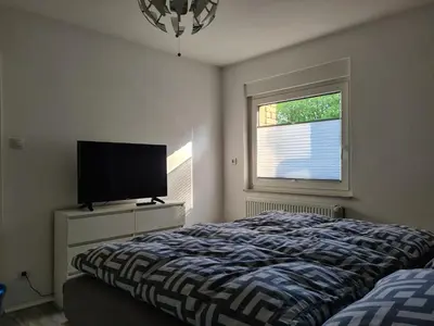 Ein Bett oder Betten in einem Zimmer der Unterkunft Ferienwohnung Saturn