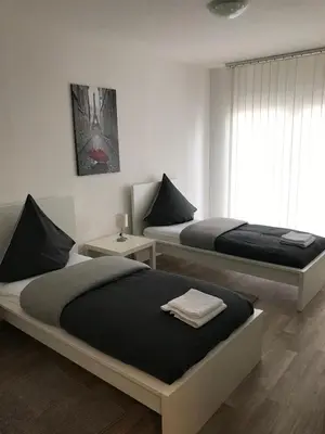 Ein Bett oder Betten in einem Zimmer der Unterkunft Monteurhome-Hagen
